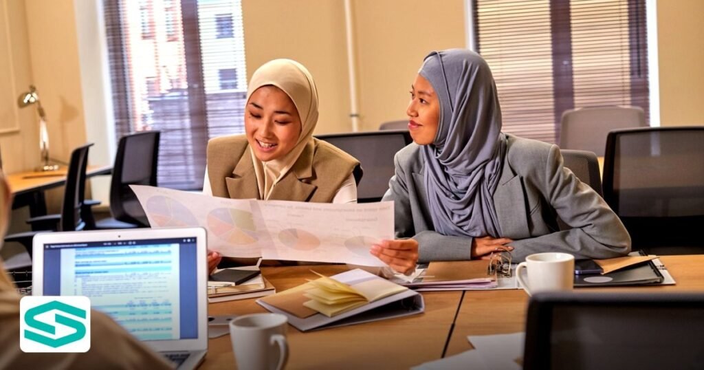 UAE Free Zone Company Setup for Jordanian Nationals in 2026: Visa, Costs and Best Zones - two female colleagues in hijabs