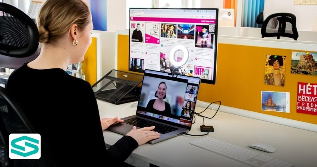 Remote International Hiring UAE Free Zone: Legal Essentials 2026 - woman engaged in a video call at her office desk, using