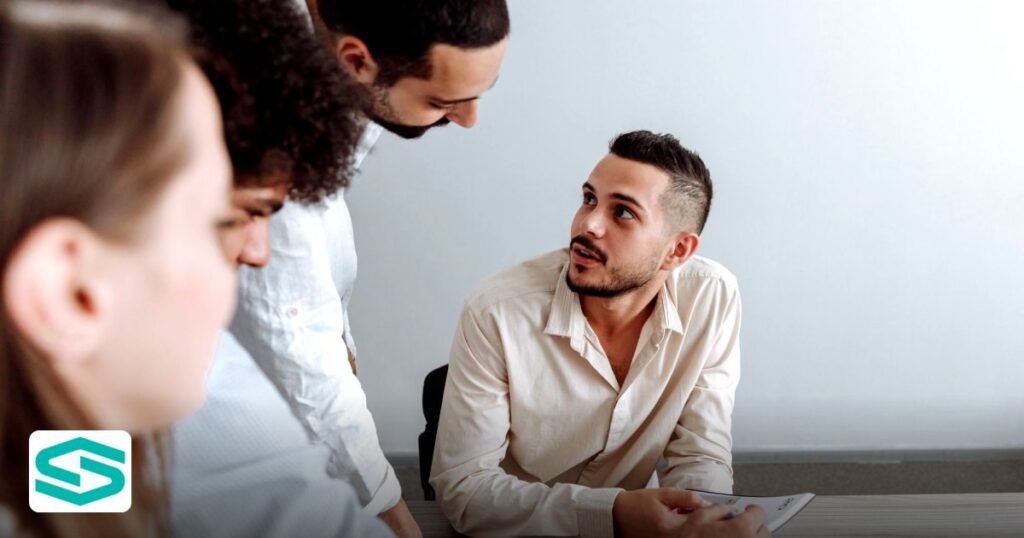 Renewable Energy Company Dubai Free Zone: Step‑by‑Step Guide 2026 - young team discussing ideas collaboratively in a modern