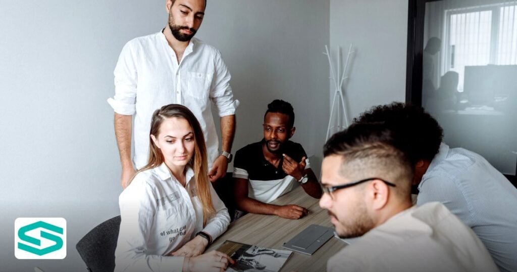 How to Secure Your UAE Free Zone Food Import Export Code in 2026 - a group of diverse colleagues engaged in a business
