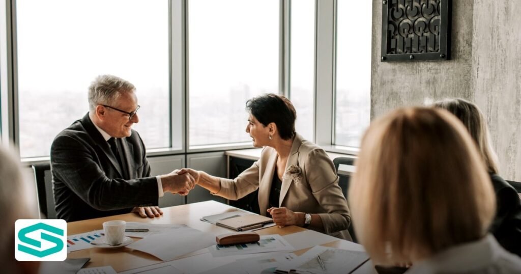 UAE Mainland Local Sponsor Requirement: Sponsor vs Service Agent Explained - colleagues in business attire shake hands